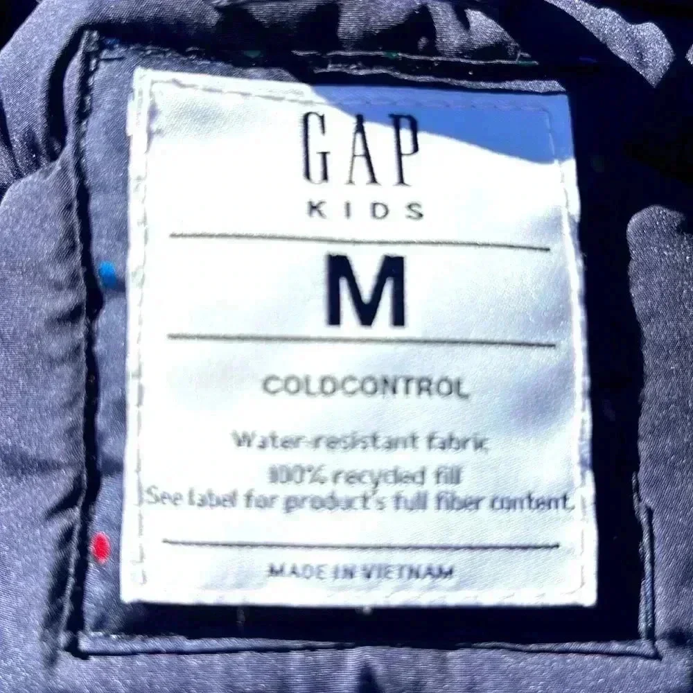 Gap Kids M (8-9yo) Cold Control Water Resistant blue puffer vest.